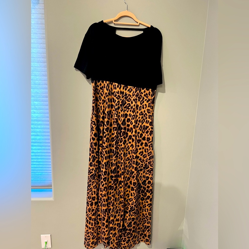 Crazy train dress S or XL back has a open V NWT